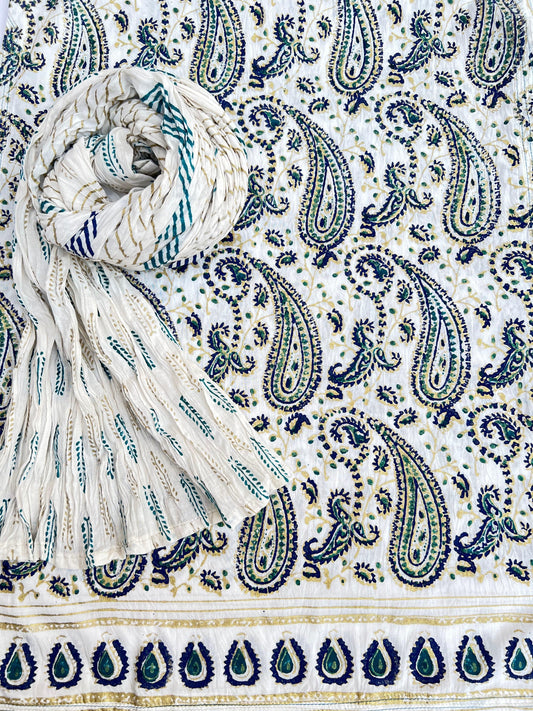 This gold and blue paisley design adds an elegant touch to our kora white fabric.