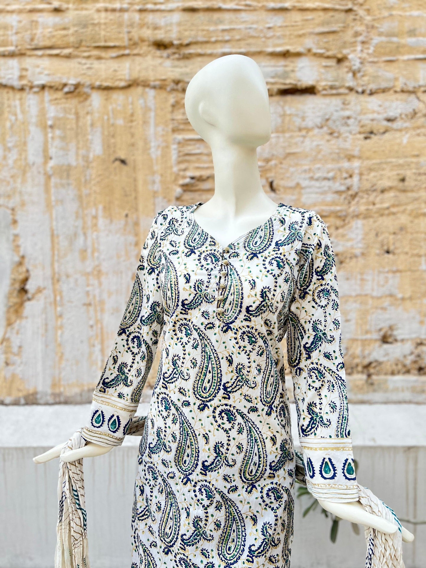 This gold and blue paisley design adds an elegant touch to our kora white