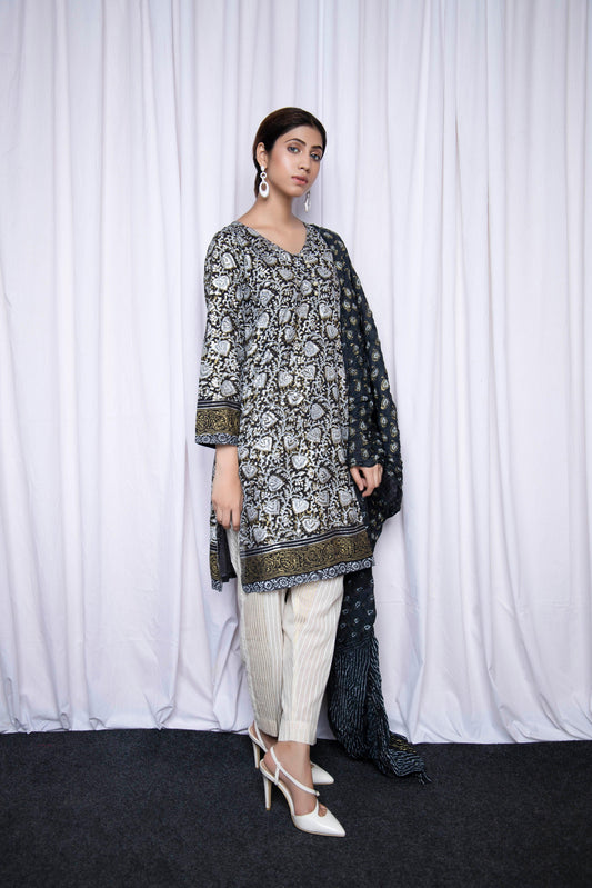 Make an enduring appearance in splendid floral hand block printed with gold and silver - Stitched Collection