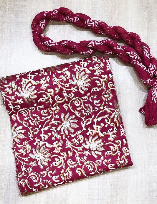 The magenta lawn fabric is block-printed with luxurious gold, silver, and white, complemented by a crushed dupatta - Unstitched Collection