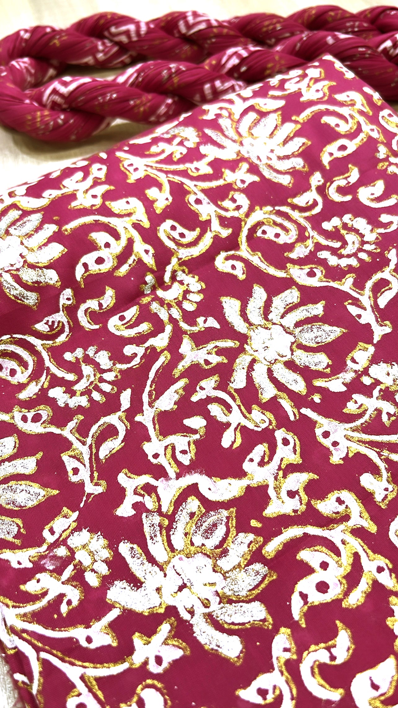 The magenta lawn fabric is block-printed with luxurious gold, silver, and white, complemented by a crushed dupatta - Unstitched Collection