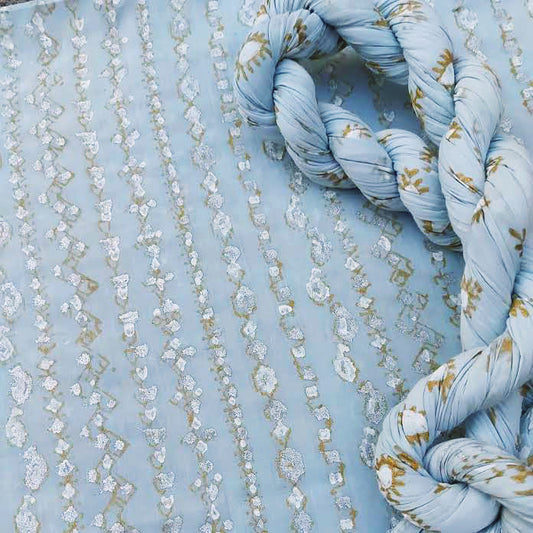 A beautiful matrix design hand block print in gold, silver, and white. - Unstitched Collection