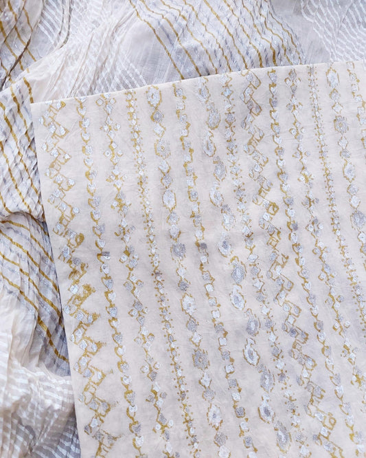 Eminent your beautiful look in this intricate design block printed with gold silver - Unstitched Collection
