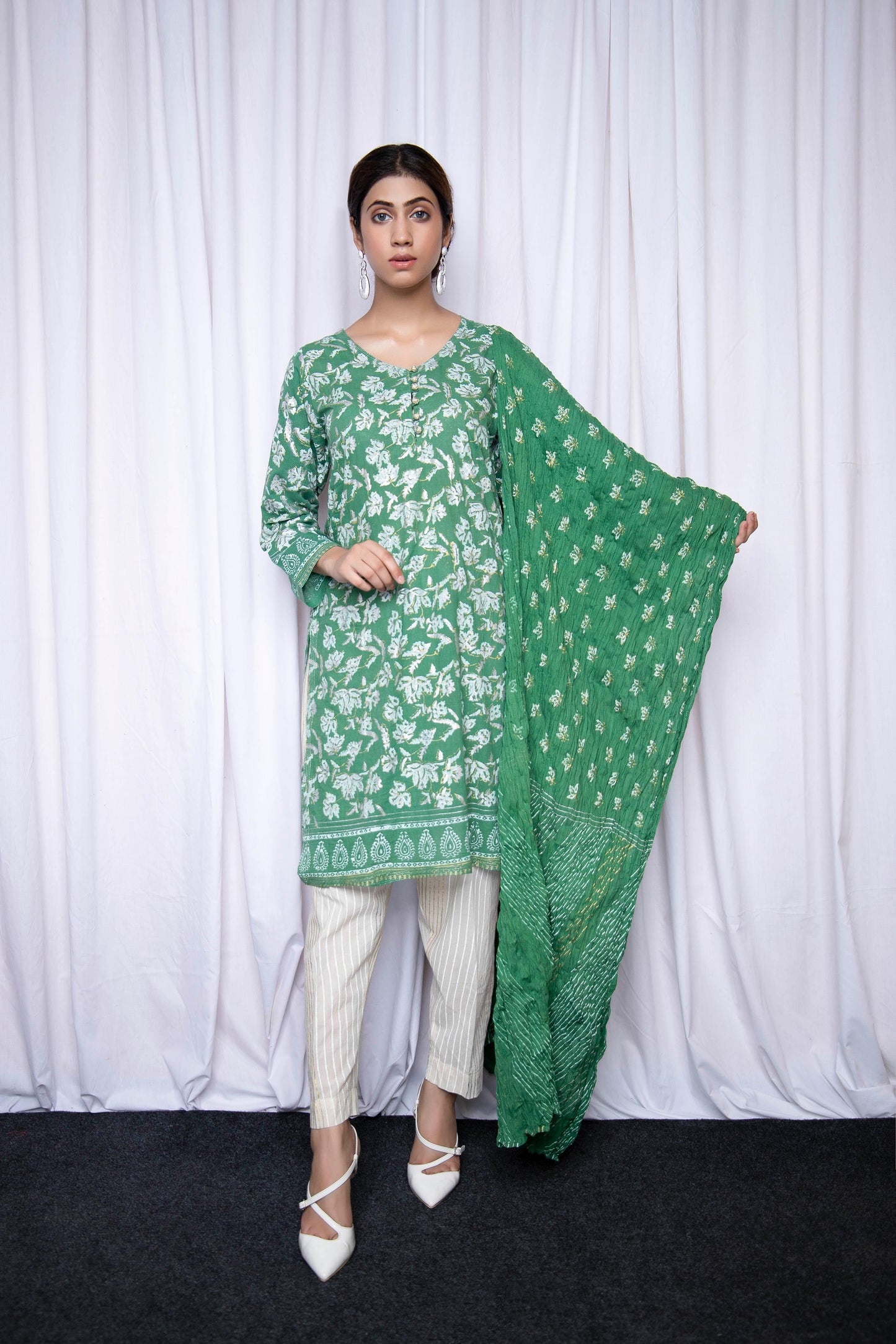 Make you own statement in this gold silver block printed on pretty green - Stitched Collection