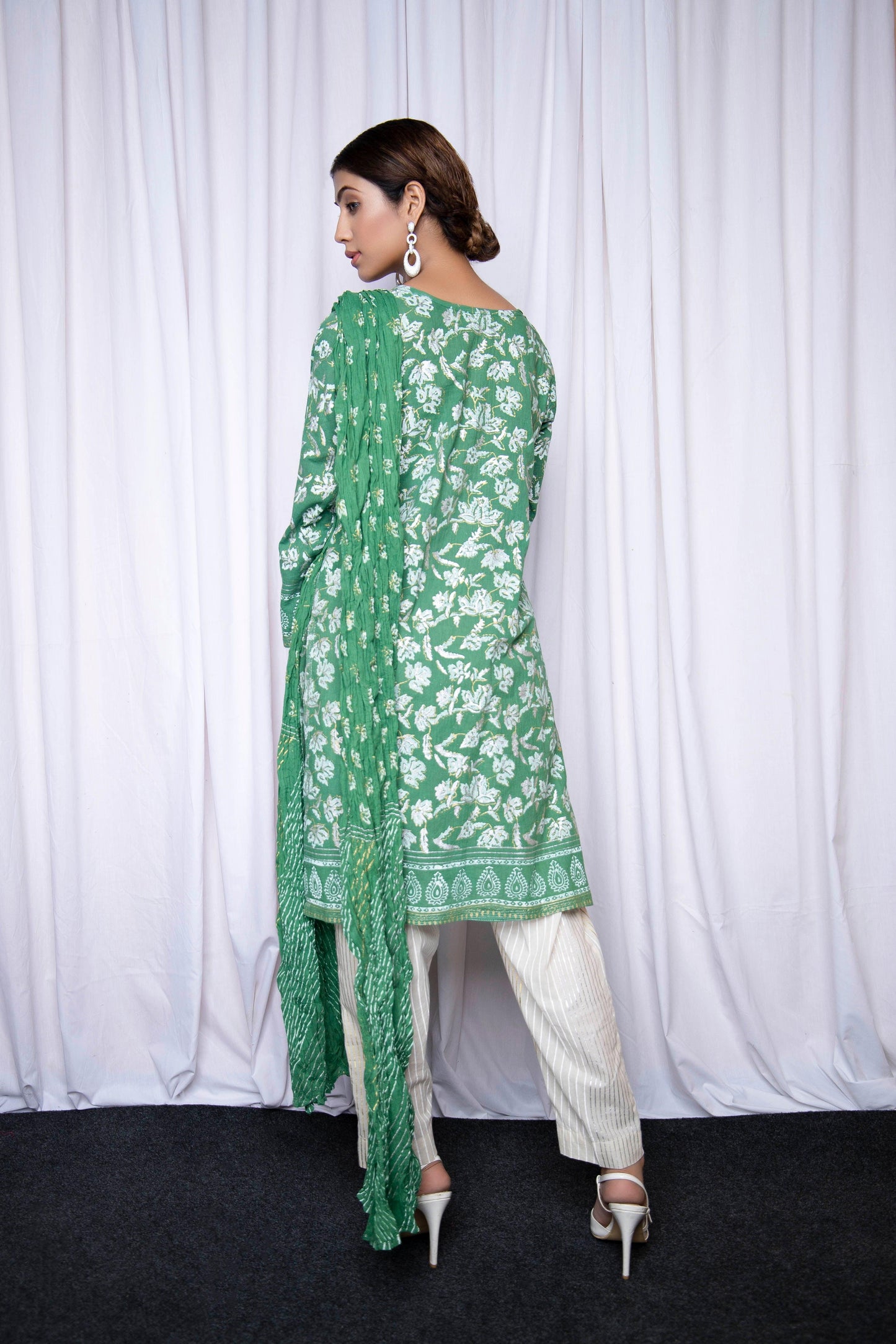 Make you own statement in this gold silver block printed on pretty green - Stitched Collection